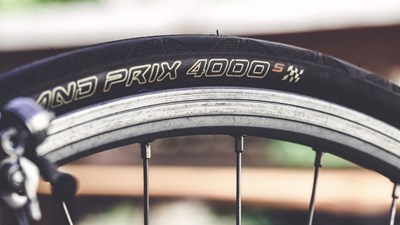 A close up of a bike wheel